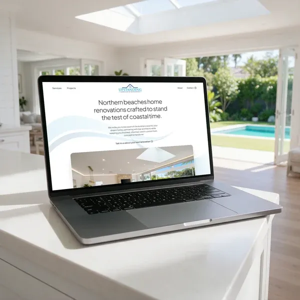 Upstanding Additions website displayed on a laptop